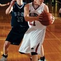 Springdale High senior forward Joseph Kellogg, right, grabs a rebound in front of Springdale Har-Ber...