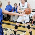 Bentonville guard Montana Lewis looks for a chance to pass against Rogers High during a Feb. 2 game ...