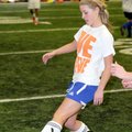 Liza Eppley turns the ball during practice at Heritage High School in Rogers on Tuesday.