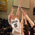 Shiloh Christian’s Jesse Parks shoots over Huntsville’s Leah Cleaver in the first half of Tuesday’s ...