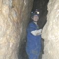  Rebekah Spurlock, park interpreter, explores one of the few areas in Satan’s Maze where cavers can ...