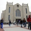 GOING UP - Students leave the Cathedral of the Ozarks following a Thursday morning worship service a...