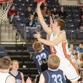 Rogers Heritage senior forward Miles Johnson shoots over Springdale Har-Ber senior forward Tyler Boo...