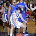 Springdale Central’s Ashley Gray is guarded by Fayetteville Woodland’s Turquoise Early, left, and Va...