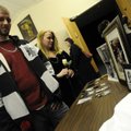 Jeremy English, left, and Shannon Dennehy look over a collection of photos and belongings of James A...