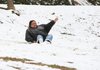  2/12/10
Arkansas Democrat-Gazette/STEPHEN B. THORNTON
Robin Coleman shrieks as she slides on a carboard box down a hillside near the Grand Promenade in Hot Springs National Park Friday afternoon. Coleman and her husband Lawrence drove from their Houston, Texas home Thursday to enjoy a Valentine's Day weekend getaway in Hot Springs and to play in the snow.