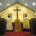 The Rev. John Antony, from left, of St. Joseph Catholic Church in Fayetteville, the Rev. John Slavin...