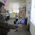 Kahirul Farazi works out a math problem Thursday in Kevin Snavely’s class at Har-Ber High School in ...
