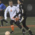 Rogers Heritage’s Liza Eppley, left, puts pressure on Bentonville’s Margaret Power during a match Fr...