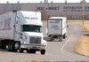 Wal-Mart Stores Inc. trucks take to the road near the company’s Bentonville distribution center in this file photo.
