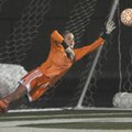 Rogers Heritage’s Ashley Schimmel dives to block a Bentonville shot during a match on Friday in Roge...