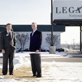 BRANCHING OUT - Don Gibson, left, and Patrick Swope, executives with Legacy National Bank, stand Wed...