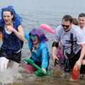 A group from the Bank of Fayetteville wades out of the water during the 2010 Polar Bear Plunge to Be...