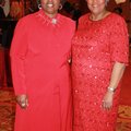Delta Sigma Theta alumnae Edith Hawkins, left, and Rita Hancock shop the silent auction at the group...