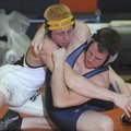 7A-WEST WRESTLING - Bentonville’s Jason Bruno, left, wrestles with Harber High School’s Hunter Black...