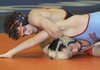 Rogers Heritage’s Cole Bundy, top, wrestles Fort Smith Southside’s Colt Dooly on Saturday during the 7A-West Conference Meet at 
Heritage High School in Rogers.
