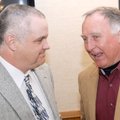 Benton County Judge hopeful Tim Henderson, left, from Gentry talks Tuesday with incumbent Benton Cou...