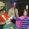 FAT TUESDAY - Brittany Matthews rings her bell in the ear of Nick Zondlak while marching in the St. ...