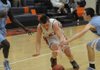 Rogers Heritage’s Mac Olinger, center, drives to the basket as Fort Smith Southside’s Cameron Adams, left, and Drew Miller (10) defend in the second half Tuesday in Rogers.

