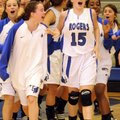Rogers High sophomore guard Sarah Grace Groves celebrates with her team after she hit a 3-pointer at...