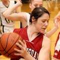 Springdale High forward Alex Light grabs a rebound in the second quarter of Tuesday’s game in Benton...