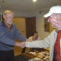  Glen Andrews greets his longtime friend and fishing buddy Bob Dickey at the Rogers Historical Museu...