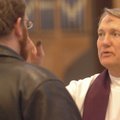  Monsignor David LeSieur of St. Vincent de Paul Catholic Church in Rogers applies ashes to the foreh...