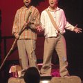  Justin Stewart, left, and Ramond Curtis, sing from their raft on the Mississippi River during a per...