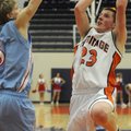  Rogers Heritage junior forward Mac Olinger 
shoots over Fort Smith Southside’s DQ Collins in the s...
