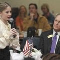  Bentonville Mayor Bob McCaslin, right, listens Friday as Skylyr McMillen, 10, speaks as Eleanor Roo...