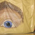  Maddy Russell, 10, peeks out of a giant ear Friday while touring an exhibit called Body Walk at Gre...
