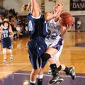  Fayetteville senior guard Sierra Shipley, right, shoots as Springdale Har-Ber senior guard Halee Ca...