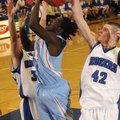 Rogers High junior guard Graham Parker tries to block the shot of Fort Smith Southside junior forwar...
