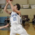 Springdale Har-Ber senior forward Michael Trexlar shoots for two against Bentonville Feb. 12 in Spri...