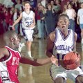  Fayetteville Woodland Junior High guard Ronnie Brewer, right, drives past Ramay Junior High’s Adria...
