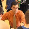  Fayetteville Woodland boys coach Jeff Boogaart talks to his team during a timeout in the first quar...