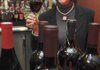  Allison Brock, co-chairwoman of the third annual Cystic Fibrosis Foundation Wine Opener, poses Wednesday for a photograph at the Doubletree Guest Suites in Bentonville. The fundraising event will be at Doubletree on Friday.
