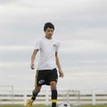  Springdale Har-Ber’s Geovanni Alfaro, 17, passes the ball to a teammate during practice Friday in S...