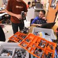 Sam Warren, left, and Matt Parisi program their robots made of plastic building blocks on Wednesday....
