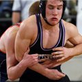 Rogers Heritage’s Casey Dye, left, and Fayetteville’s Cameron Baker wrestle in the 152-pound class S...