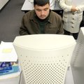 Rogers High School student Eric Torres, 18, looks at ways to continue his education during College G...