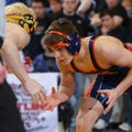 STATE WRESTLING TOURNAMENT - Rogers Heritage’s Paxon Fowler, right, and Bentonville’s Spencer McMurt...