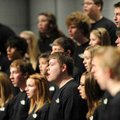  Jeremy Hopper, center, a senior at Har-Ber High School, sings with the rest of the school’s Camerat...