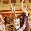 Gentry’s Kendra Boyd, right, takes the ball to the hoop as Ozark’s Emily Hawkins defends Wednesday d...