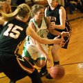 STAFF PHOTO J.T. WAMPLER 
Greenland’s Lexington Mathais drives between a pair of Lamar defenders We...