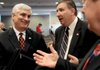 Nick Brown (right), chief executive of Southwest Power Pool, sits with Gov. Mike Beebe and Little Rock Chamber of Commerce Chairman Barbara Graves during Friday’s news conference.