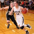 Shiloh Christian junior Hannah Persing drives past Pottsville senior Mariah Jeffcoat during the firs...