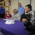 NEWEST GOLDEN EAGLE - Fayetteville’s Brandon Sikes, center, signs a letter of intent Tuesday to play...