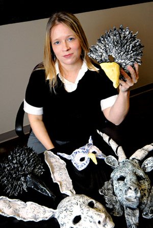 Chris Massingill is an instructor at the Blackbird Academy of Arts and teaches art in Conway elementary schools. She has created a variety of masks as an art project, which also ties into the upcoming masquerade ball sponsored by the Blackbird Academy.