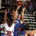 Rogers High sophomore guard Josh Anderson shoots over Springdale High sophomore forward Kempys Robin...
